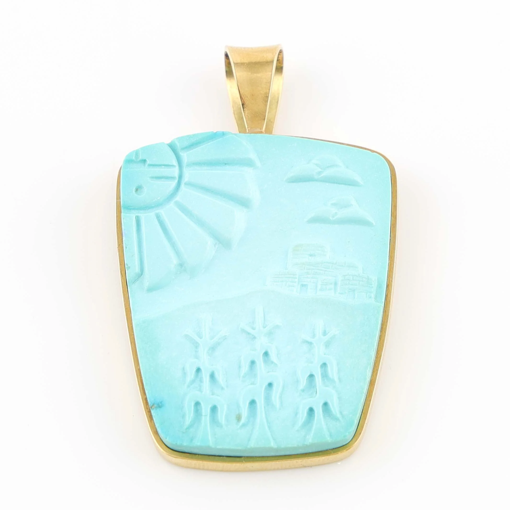 Carved Turquoise and Gold Pendant